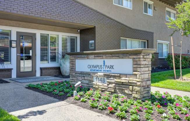 a brick building with a sign that reads owens park dental office