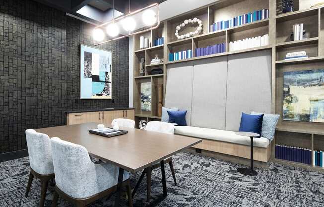 a conference room with a table and chairs