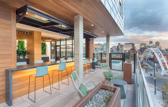 Outdoor lounge with dining areas and gorgeous views of Denver.