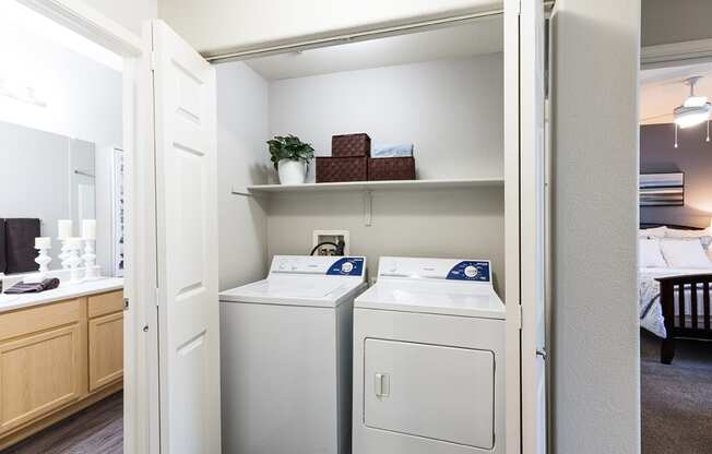 Washer and dryer area with shelf