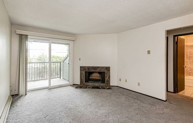 1BD 1BA Single Level Condo + Fireplace + 1 Car Garage + Fitness Center + Tennis Courts + Community Pool