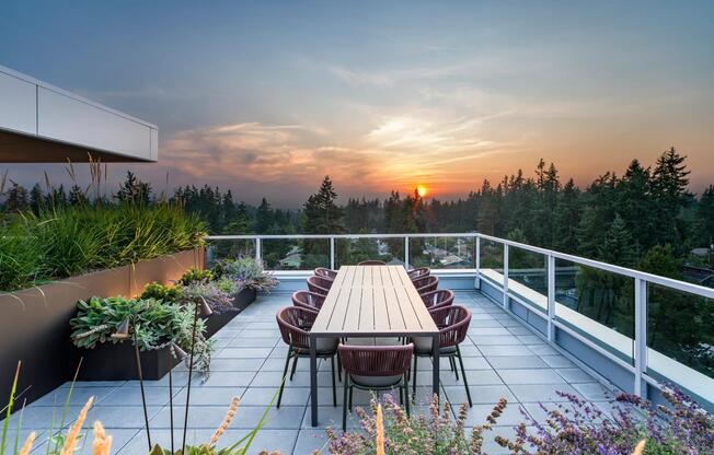 Take in sweeping treetop views from Modera Shoreline’s rooftop terrace—an inviting space to gather, dine, and watch the sunset over Puget Sound.