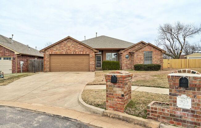 Beautiful 4BD/2BTH with a 2 car garage that's Located in the Cedar Pointe Gated Community