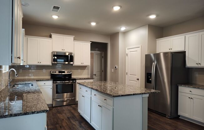 Gorgeous 5 beds, 2.5 bath home located in the Whispering Pines Community!