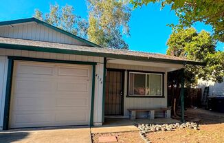 Charming 2-Bedroom Duplex with Large Fenced Yard & Attached Garage