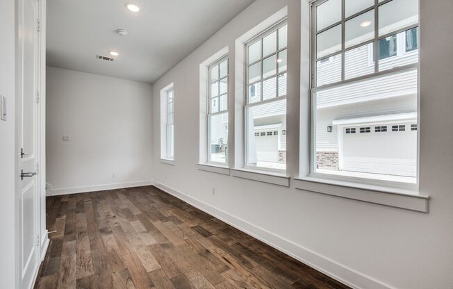 Welcome to a beautiful Craftsman-style Townhome