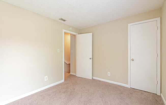 a bedroom with a carpeted floor and at Del Rio Apartment