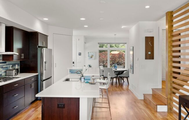 Modern 4BR/3.5BA Duplex with Finished Basement & Solar in Prime Denver Location