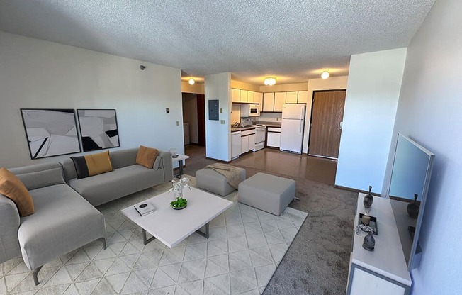 a view of the living room and kitchen from the balcony