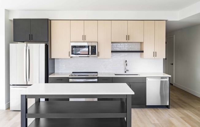 Discover culinary excellence at Modera Golden Triangle in Denver. Our gourmet kitchens feature quartz countertops, 42-inch custom cabinetry, and under-cabinet lighting, paired with an ENERGY STAR® stainless steel appliance package.