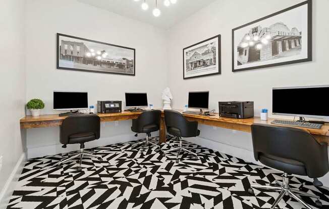A black and white patterned carpet covers the floor of a modern office.