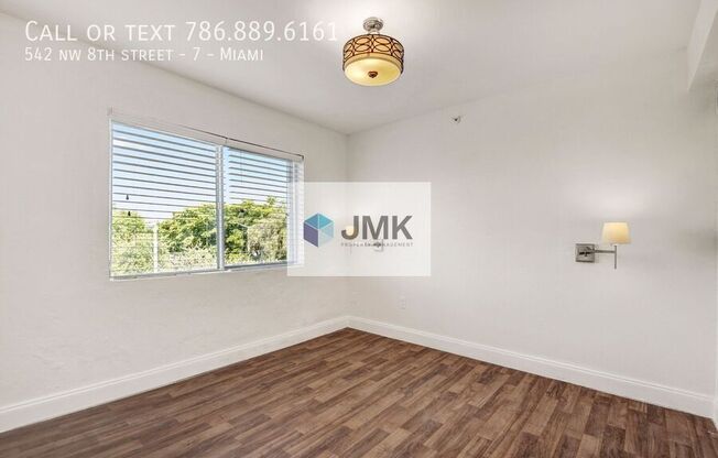 542 NW 8 ST
