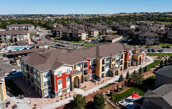 an aerial view of an apartment complex in a city