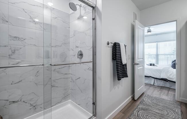 a bathroom with a shower at Altis Grand Suncoast, Land O' Lakes