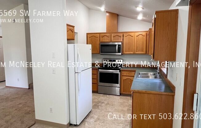 15569 SW FARMER WAY