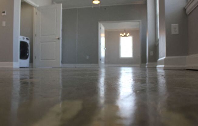 Polished concrete flooring in apartment home at Thomas Jefferson Tower, Alabama, 35203