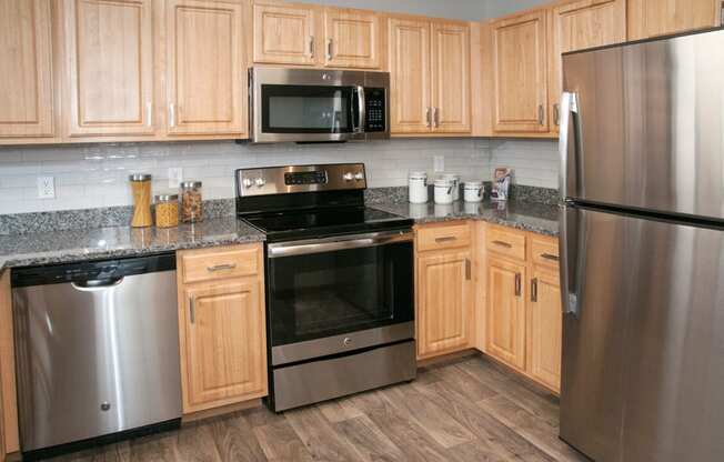 Granite countertops, backsplash, stainless steel appliances!