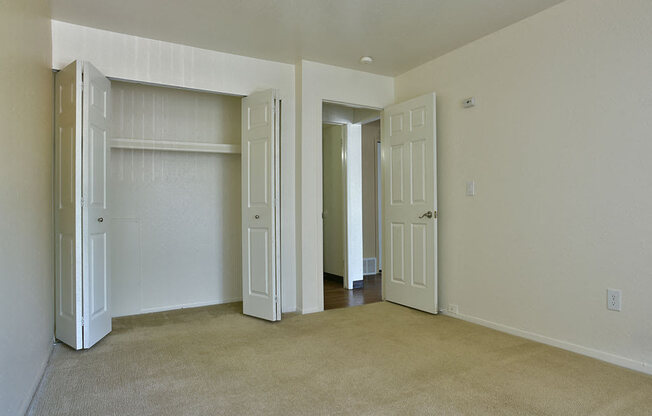 Bedroom with Carpeting at Woodland Place, Midland, MI