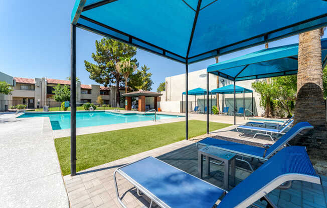 Covered poolside gathering area at Sono Tempe, a pet-friendly apartment community in Tempe, AZ.