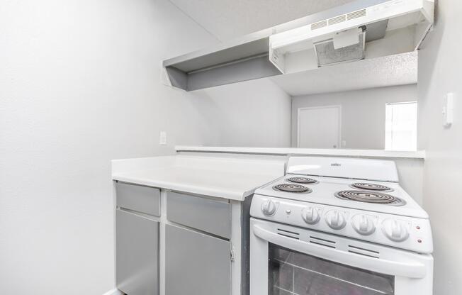 a microwave oven sitting on top of a stove