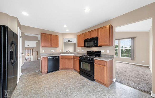 AUTUMN CREEK SECOND FLOOR CONDO WITH TWO CAR GARAGE