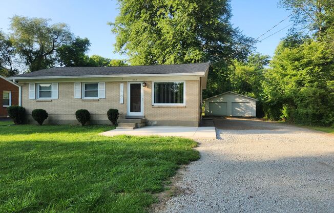 Beautiful and spacious 3 bedroom 1 bath home with large detached garage and updates!
