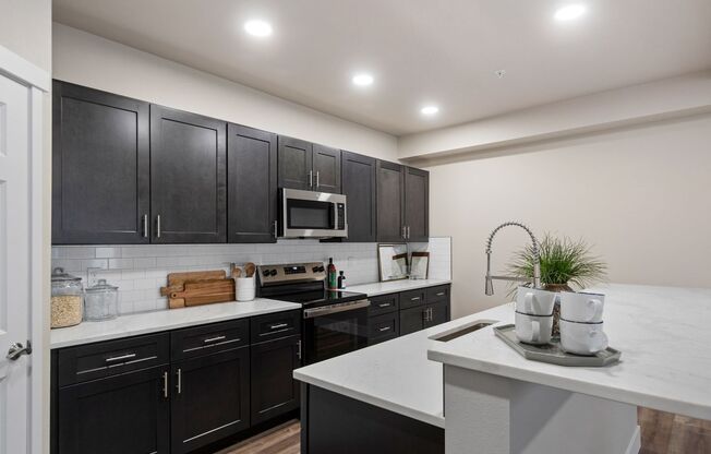 2 beds, 2 baths, 1,199 sqft, $1,750, Unit J-402