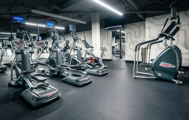 Gym with various equipment at Vera Cortez Hill, San Diego