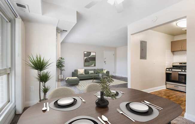 A modern dining room with a table set for two.