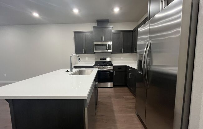Exceptional 3-Bedroom Modern Home with Island Kitchen, Spacious Living, and Attached Garage