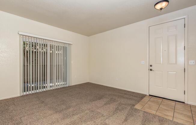 a bedroom with a bed in a room