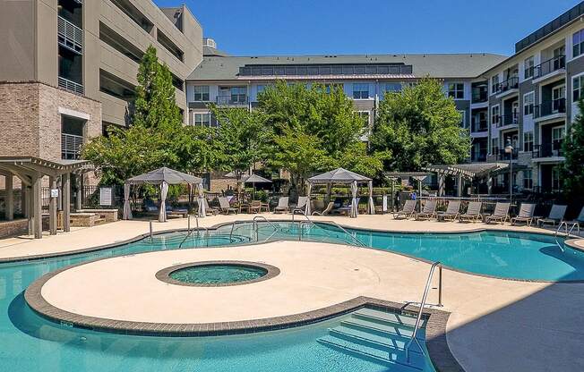 a large swimming pool with a building in the background at The Tribute, North Carolina