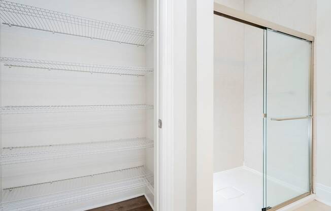 a walk in closet in a 555 waverly unit