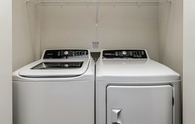 New building with white and dark color schemes with one, two and three bedroom apartment homes at CopperCreek Apartments in Council Bluffs, IA