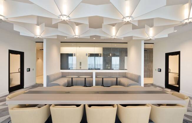 a conference room with a large table and chairs at Platform 4611, Chicago, IL