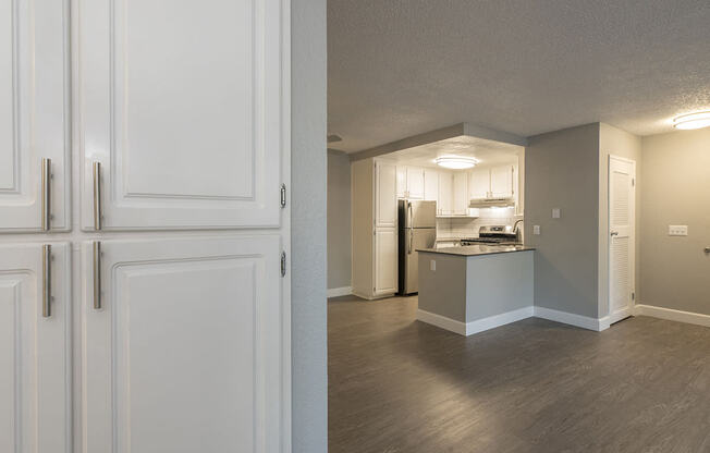 Cupboards by kitchen and dining l Vue at the Lake in Sacramento