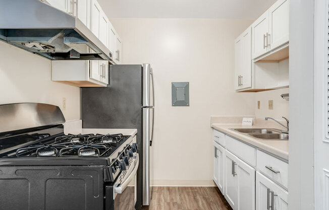 White Shaker-Style Cabinetry Private Balcony at Wood Creek Apartments in Kenosha, WI