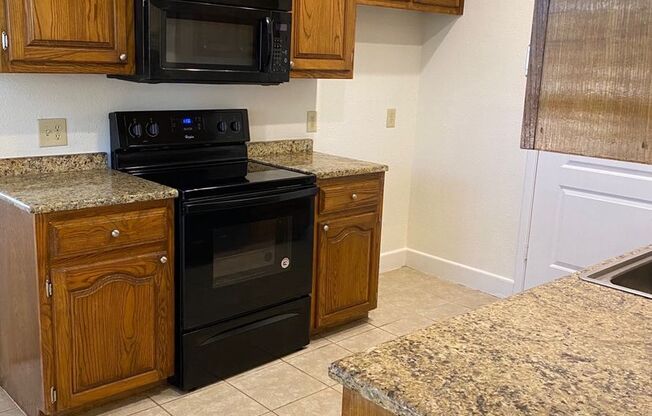 Recently updated spacious 2 bedroom duplex split with small patio and yard.