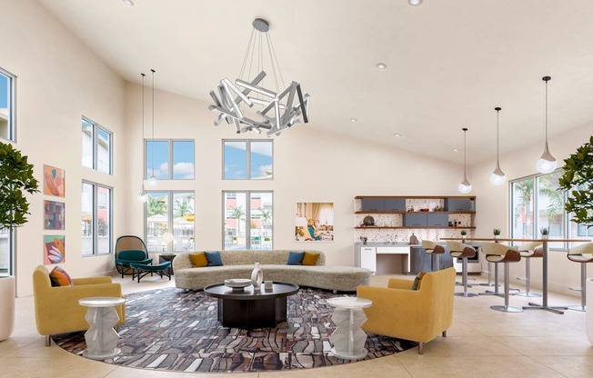 An artist rendering of the new Leasing Office with yellow couches and chairs and a large chandelier at Canyon Terrace Apartments, California, 95630