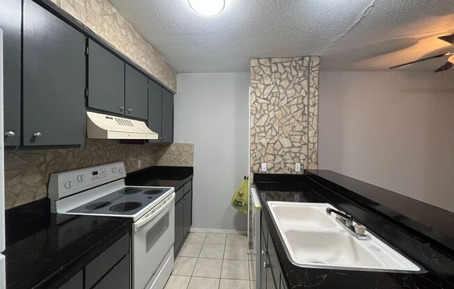 SECOND STORY ONE BEDROOM CONDO!