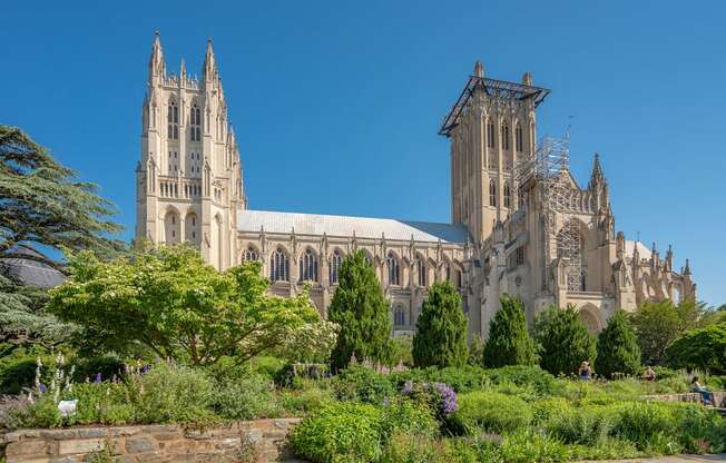 a cathedral with a garden in front of it