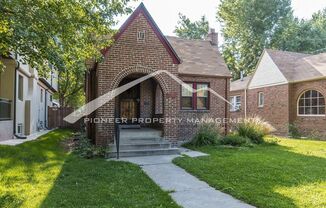 Classic Brick Bungalow with Central AC and 1 Car Garage!