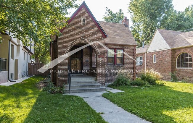 Classic Brick Bungalow with Central AC and 1 Car Garage!