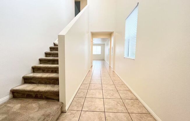 Modern 4BR Home with Island Kitchen, Tile Floors & Great Schools Nearby