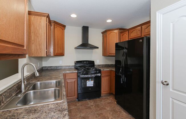 Here’s a more concise version of the description:  Spacious 4-Bedroom Home with Modern Upgrades