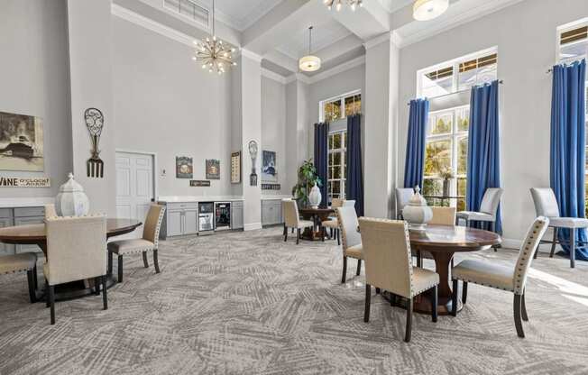 a dining room with a table and chairs and a fireplace