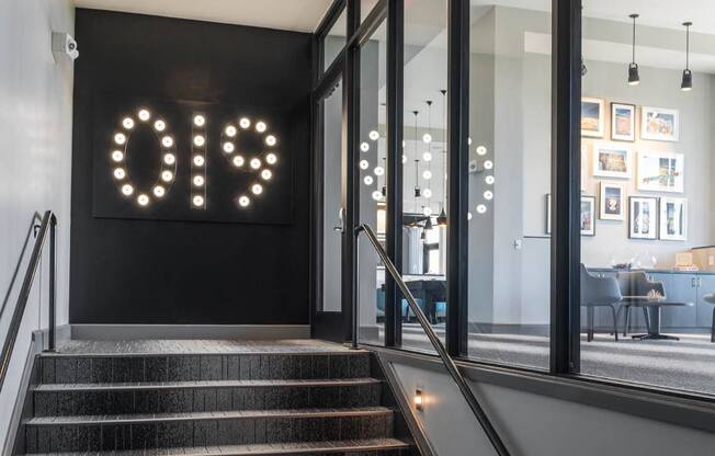 a staircase in the lobby at Tinsley on the Park apartments