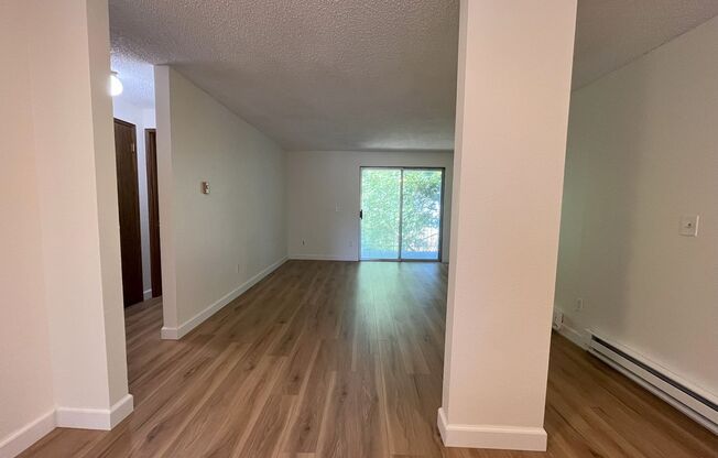 Charming Condo with Creek Views, Laminate Flooring, and Prime Location Near Washington Square!