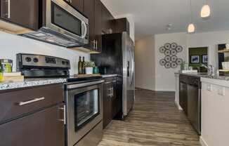 Kitchen at Westlink at Oak Station Apartments in Lakewood, CO