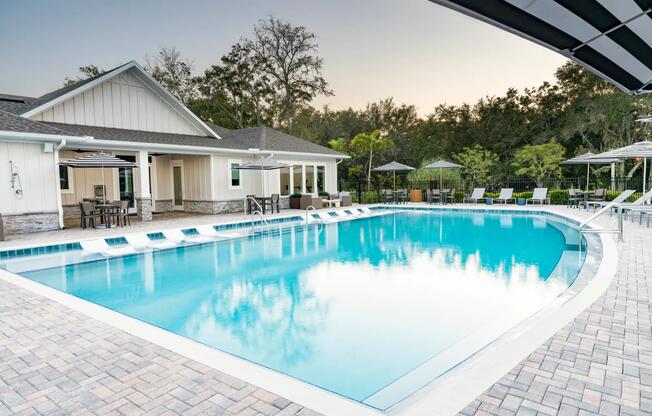 Refreshing poolside spaces at Amavi Kissimmee keep you close to local attractions, offering a relaxing retreat at the heart of this connected Florida community.